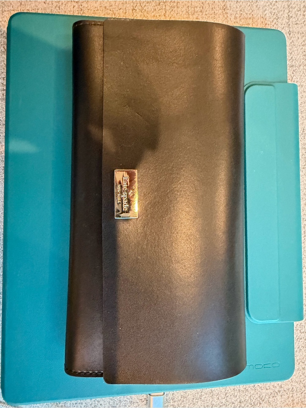 Kate Spade black billfold.